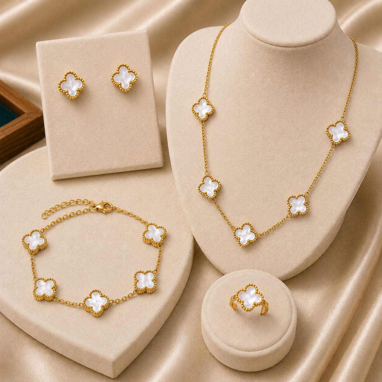 Shop an elegant premium stainless steel gold clover jewelry set for women in Qatar. Includes necklace, bracelet, ring and matching earrings. Perfect for gifting.