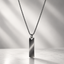 A polished rectangular pendant men necklace on a fine chain in doha qatar