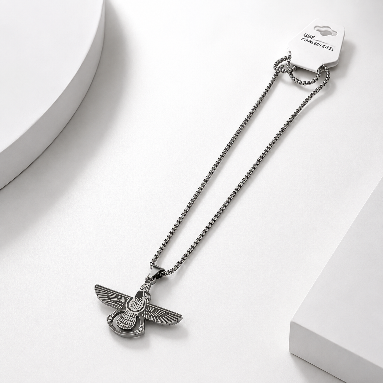 A silver-toned stainless steel  eagle pendant for men necklace featuring a winged insect or beetle design.