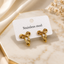 Shop elegant gold bow earrings for women in Qatar. Made from premium stainless steel with a stylish gold-tone finish, perfect for everyday wear and gifting.