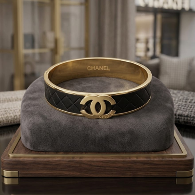 Chanel Luxury Black & Gold Bangle