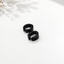 Shop premium black stainless steel huggie hoop earrings for men in Doha, Qatar. Waterproof, fade-resistant, hypoallergenic earrings with fast delivery across Qatar.