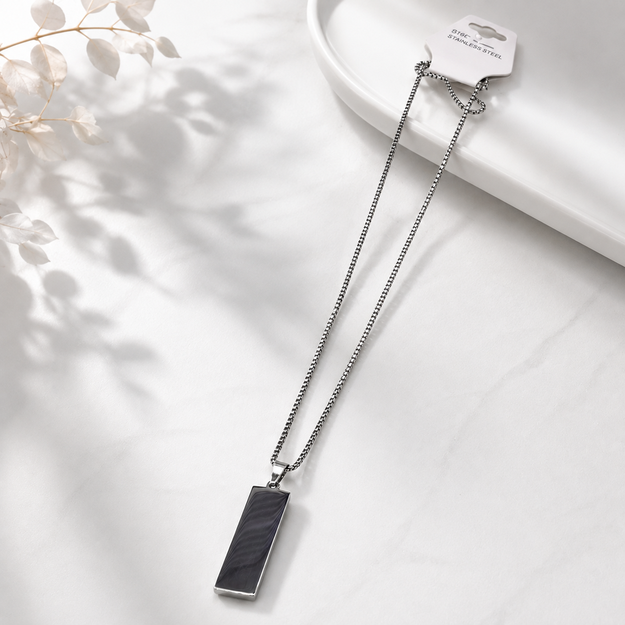 Buy premium men's black rectangle pendant necklace in Doha, Qatar. Stainless steel, waterproof, fade-resistant minimalist necklace with fast delivery across Qatar.