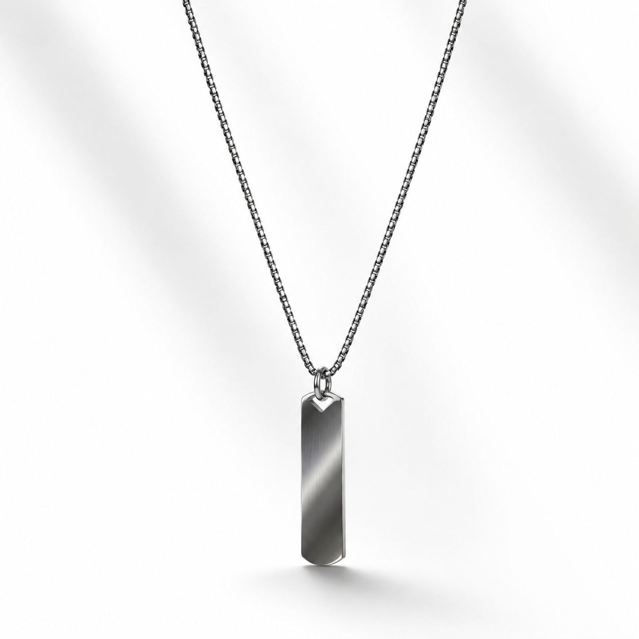 Buy premium men's silver bar pendant necklace in Doha, Qatar. Stainless steel, waterproof, fade-resistant minimalist necklace with fast delivery across Qatar.