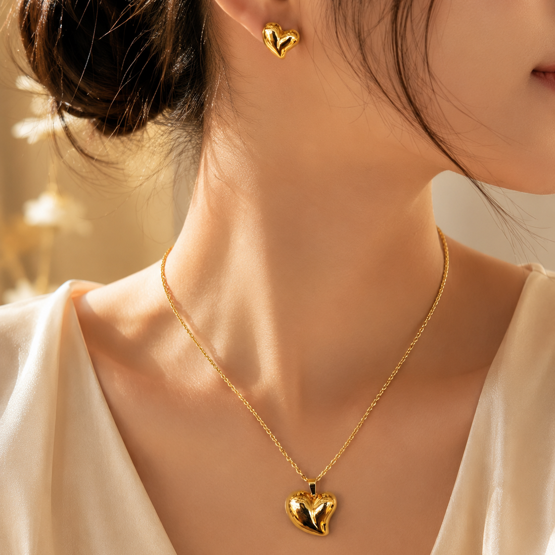 Premium stainless steel gold heart necklace and matching earrings set for women in qatar